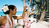 twin hula dancers perform for the Hawaiian wedding at waimanalo
